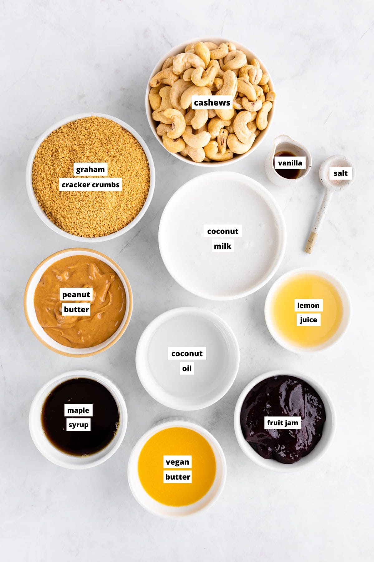 bowls of ingredients for no-bake peanut butter and jelly cheesecake bars